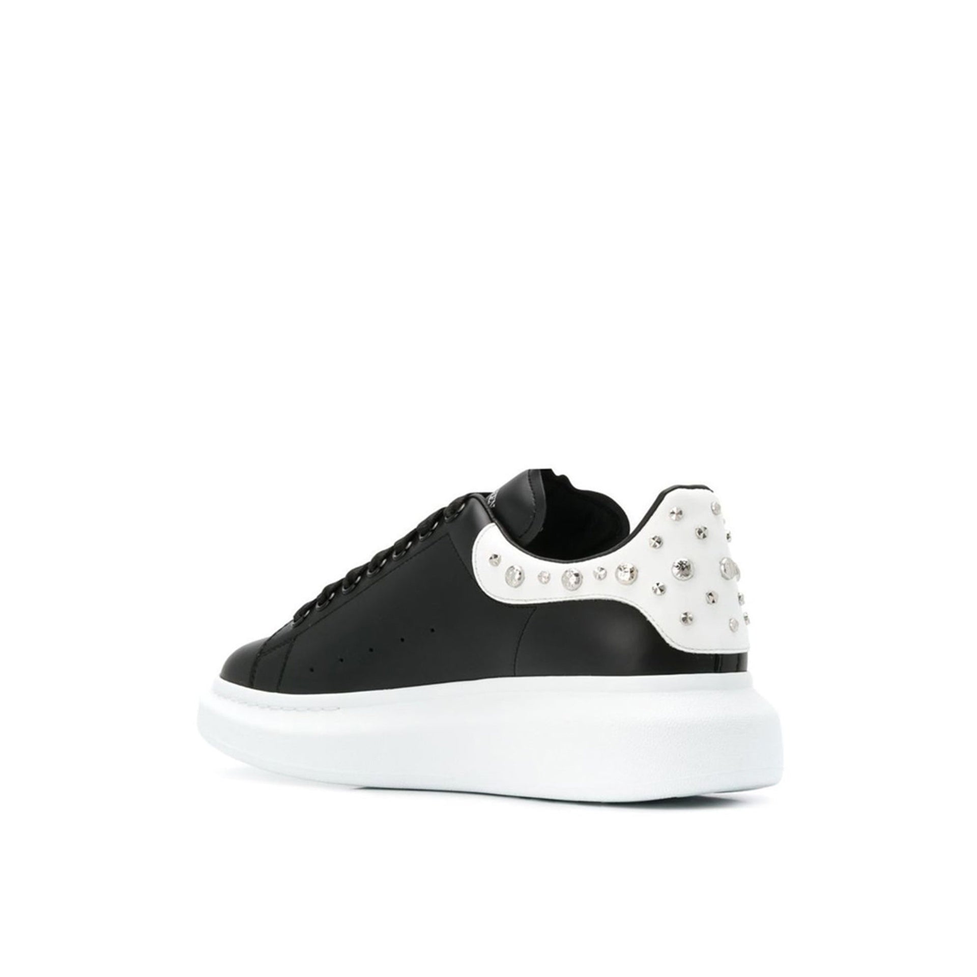 ALEXANDER MCQUEEN  Sneakers Alexander McQueen Nere in Pelle Borchiata Prezzo Ridotto