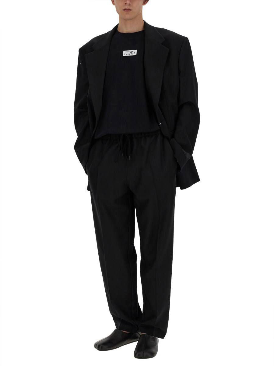 MM6 MAISON MARGIELA PANTALONE IN LANA CON GAMBA AFFUSOLATA Italy
