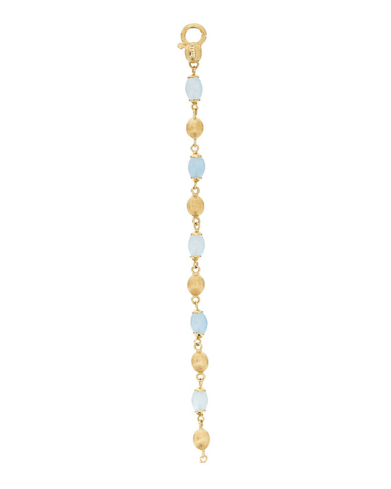 Nanis Bracciale "DANCING AZURE" casual in oro e acquamarina – Nanis Italian Jewels 2025