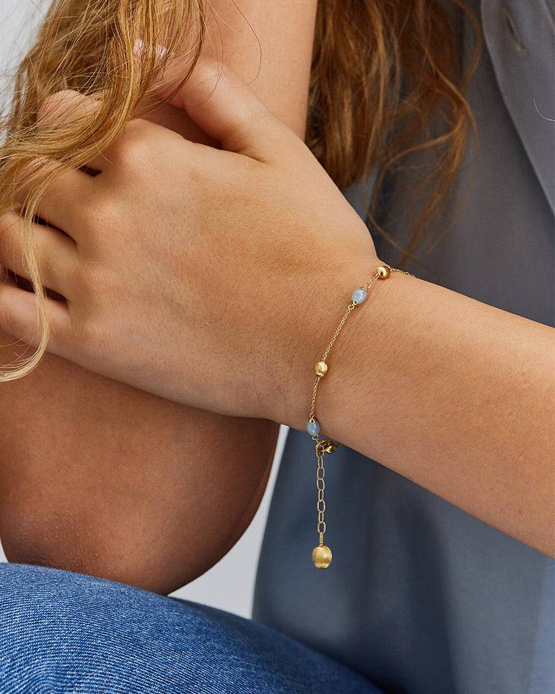Nanis Bracciale "DANCING AZURE" minimale in oro e acquamarina – Nanis Italian Jewels Italy