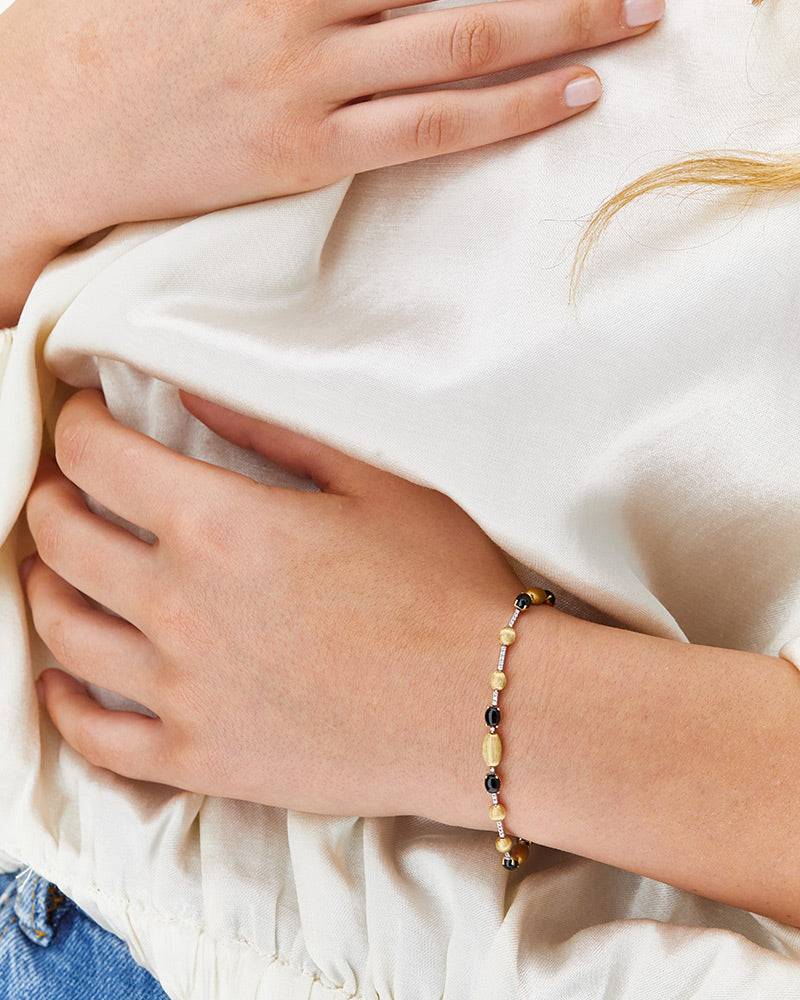Nanis Bracciale tennis "DANCING MYSTERY BLACK" in oro, diamanti e onice nero – Nanis Italian Jewels Italy
