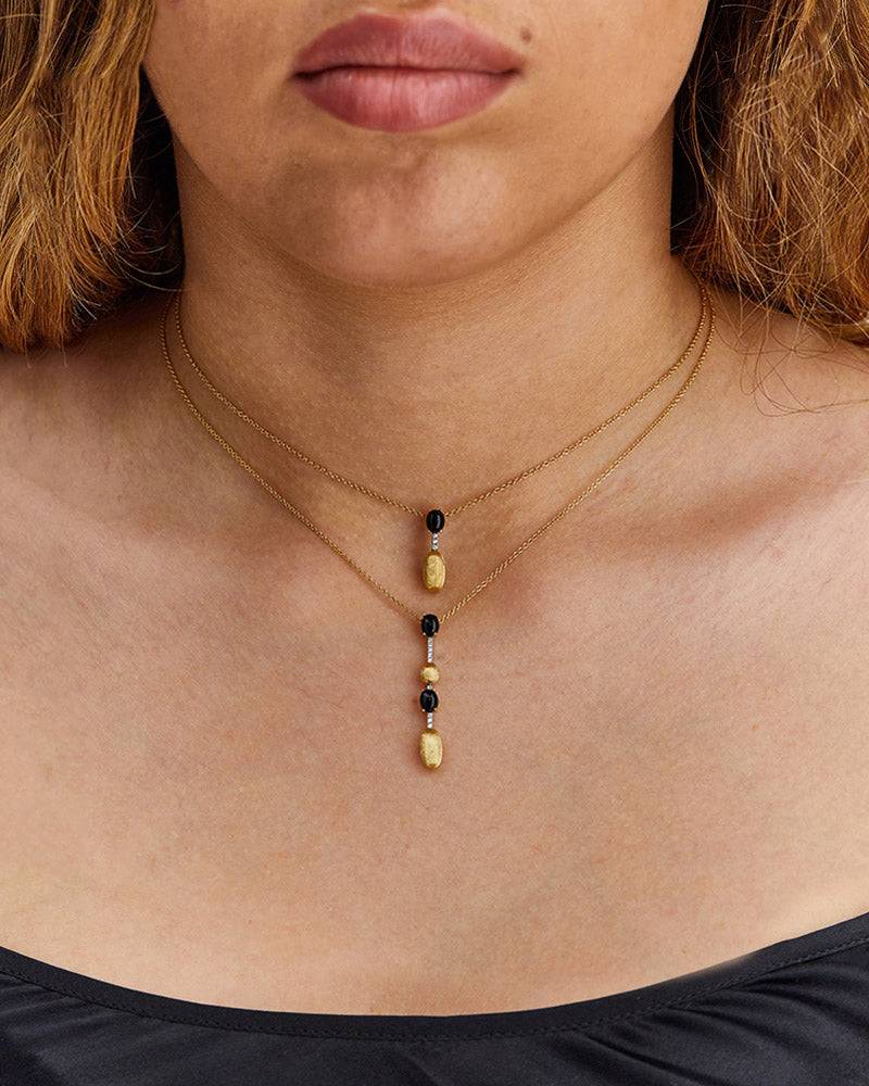 Nanis Collana "DANCING MYSTERY BLACK" pendente in oro, diamanti e onice nero – Nanis Italian Jewels Spedizione Gratuita