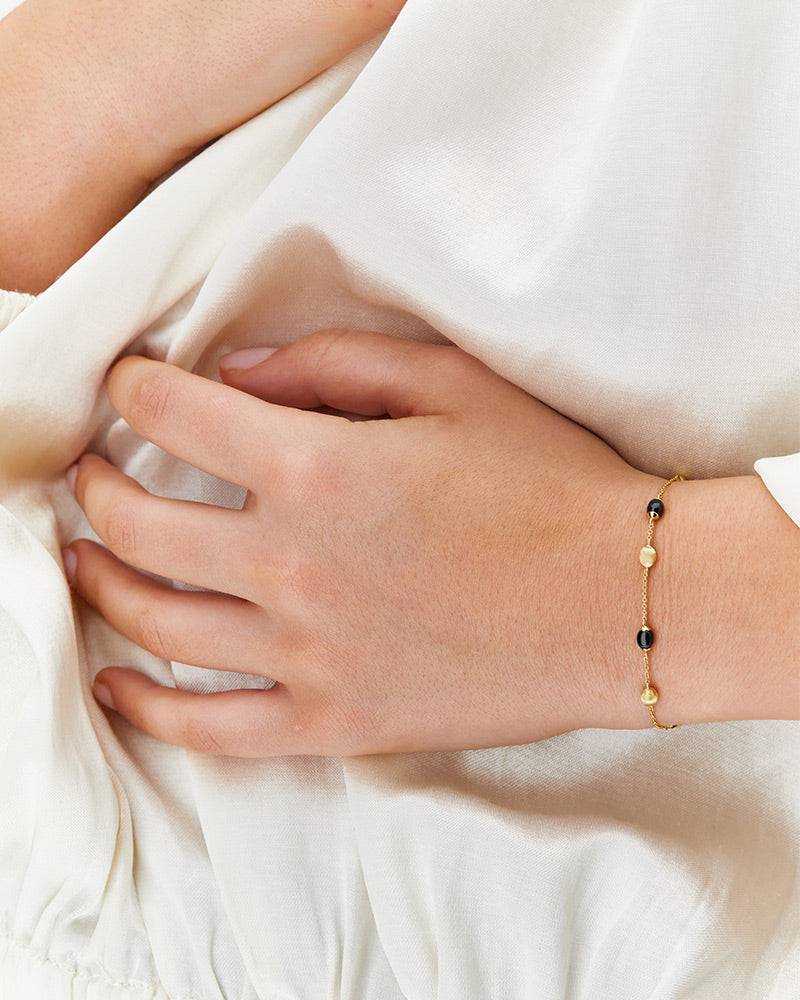 Nanis Bracciale "DANCING MYSTERY BLACK" essenziale in oro e onice nero – Nanis Italian Jewels Sottocosto