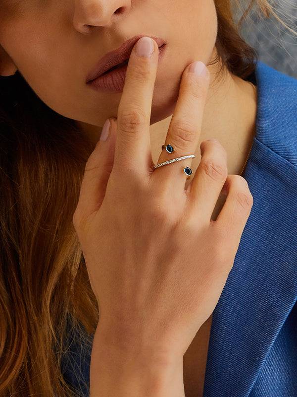 Nanis Anello ad incrocio "DANCING AZURE" in oro, diamanti e topazio London b – Nanis Italian Jewels In Linea